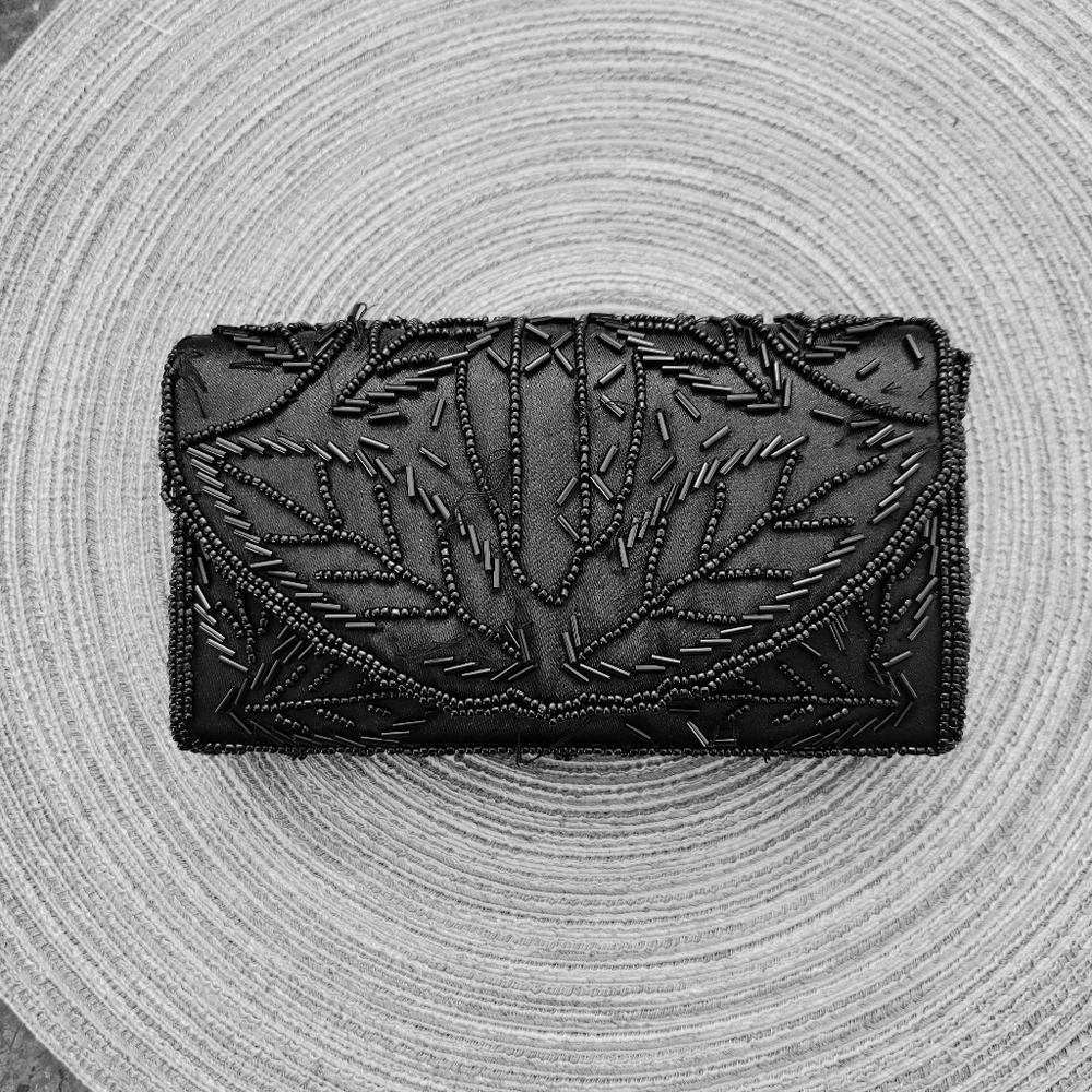 Black beaded hand-held clutch